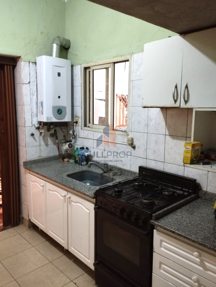 VIVIENDA COLECTIVA UBICADA EN LAVALLE AL 100  (6 UNIDADES FUNCIONALES)